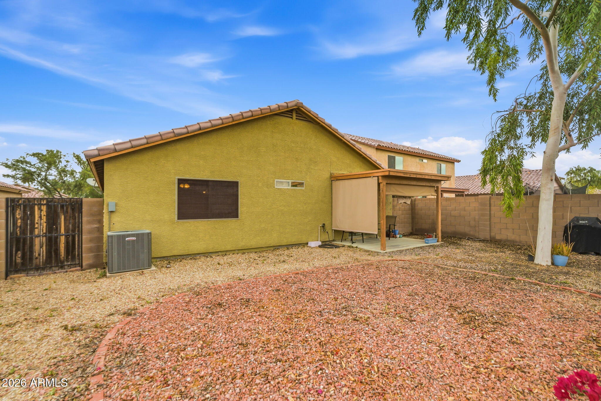 15843 West Washington Street Goodyear, AZ 85338 - Photo 35 of 39 a view of backyard of house