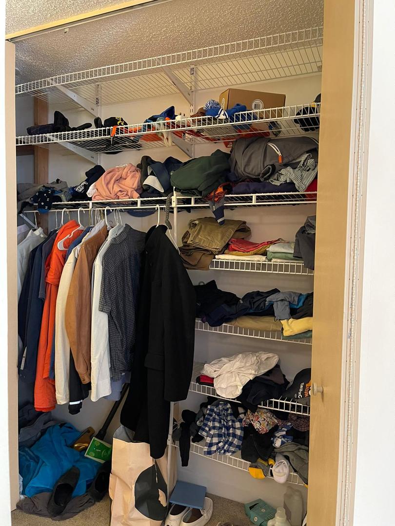 200 North Dearborn Street, Unit 1901 Chicago, IL 60601 - Photo 17 of 24 a view of walk in closet with clothes and shoes