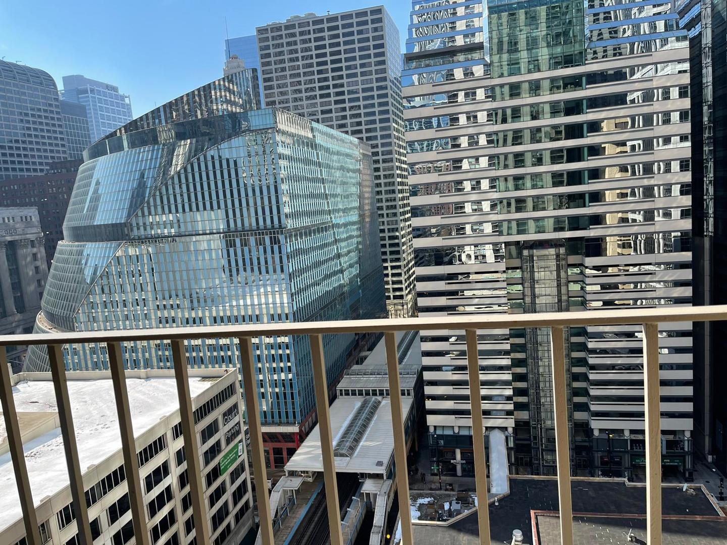 200 North Dearborn Street, Unit 1901 Chicago, IL 60601 - Photo 19 of 24 a view of balcony with wooden floor