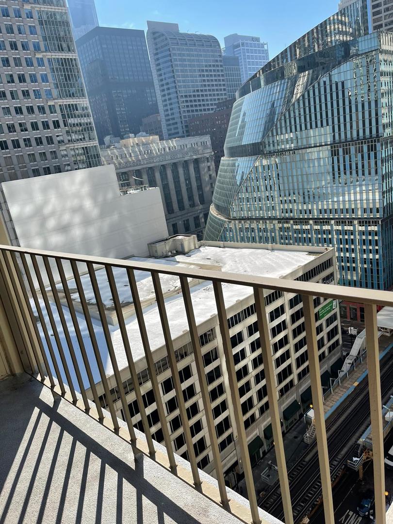 200 North Dearborn Street, Unit 1901 Chicago, IL 60601 - Photo 20 of 24 a view of a balcony