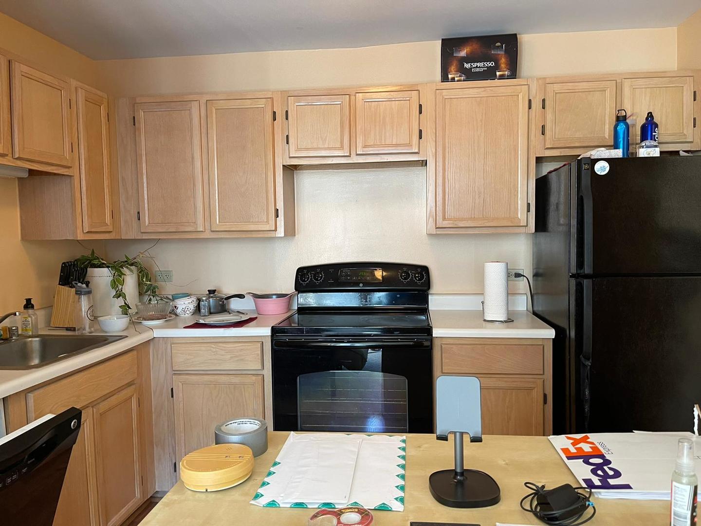 200 North Dearborn Street, Unit 1901 Chicago, IL 60601 - Photo 3 of 24 a kitchen with a sink a stove and refrigerator
