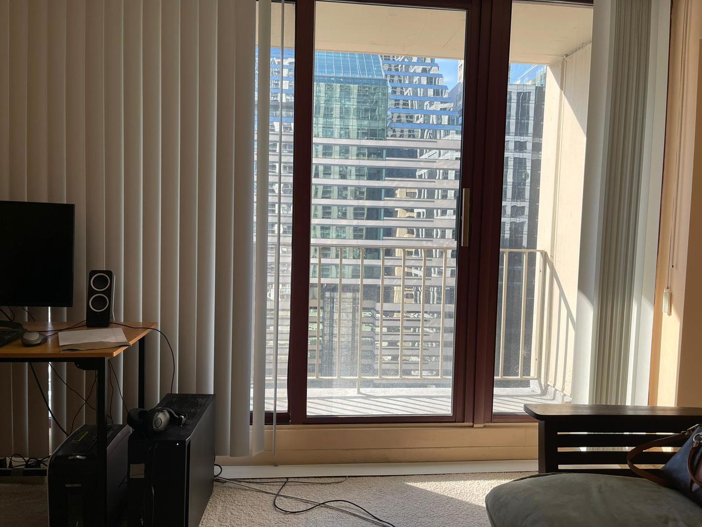 200 North Dearborn Street, Unit 1901 Chicago, IL 60601 - Photo 8 of 24 a view of a living room and a window