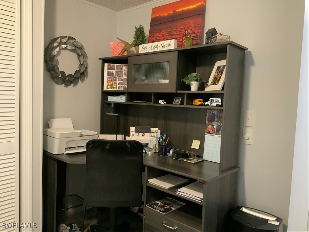 15550 Burnt Store Road, Unit 86 Punta Gorda, FL 33955 - Photo 17 of 36 a dining room with furniture and a fireplace