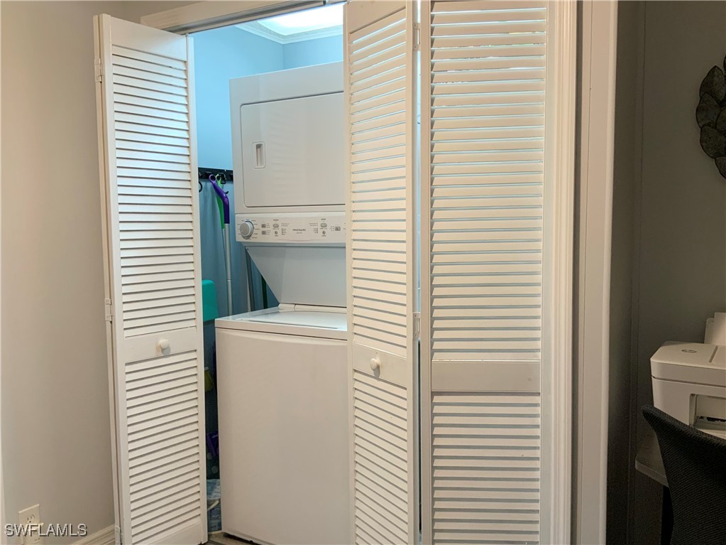 15550 Burnt Store Road, Unit 86 Punta Gorda, FL 33955 - Photo 18 of 36 a utility room with dryer and washer