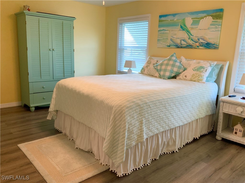 15550 Burnt Store Road, Unit 86 Punta Gorda, FL 33955 - Photo 20 of 36 a bedroom with a bed and a window