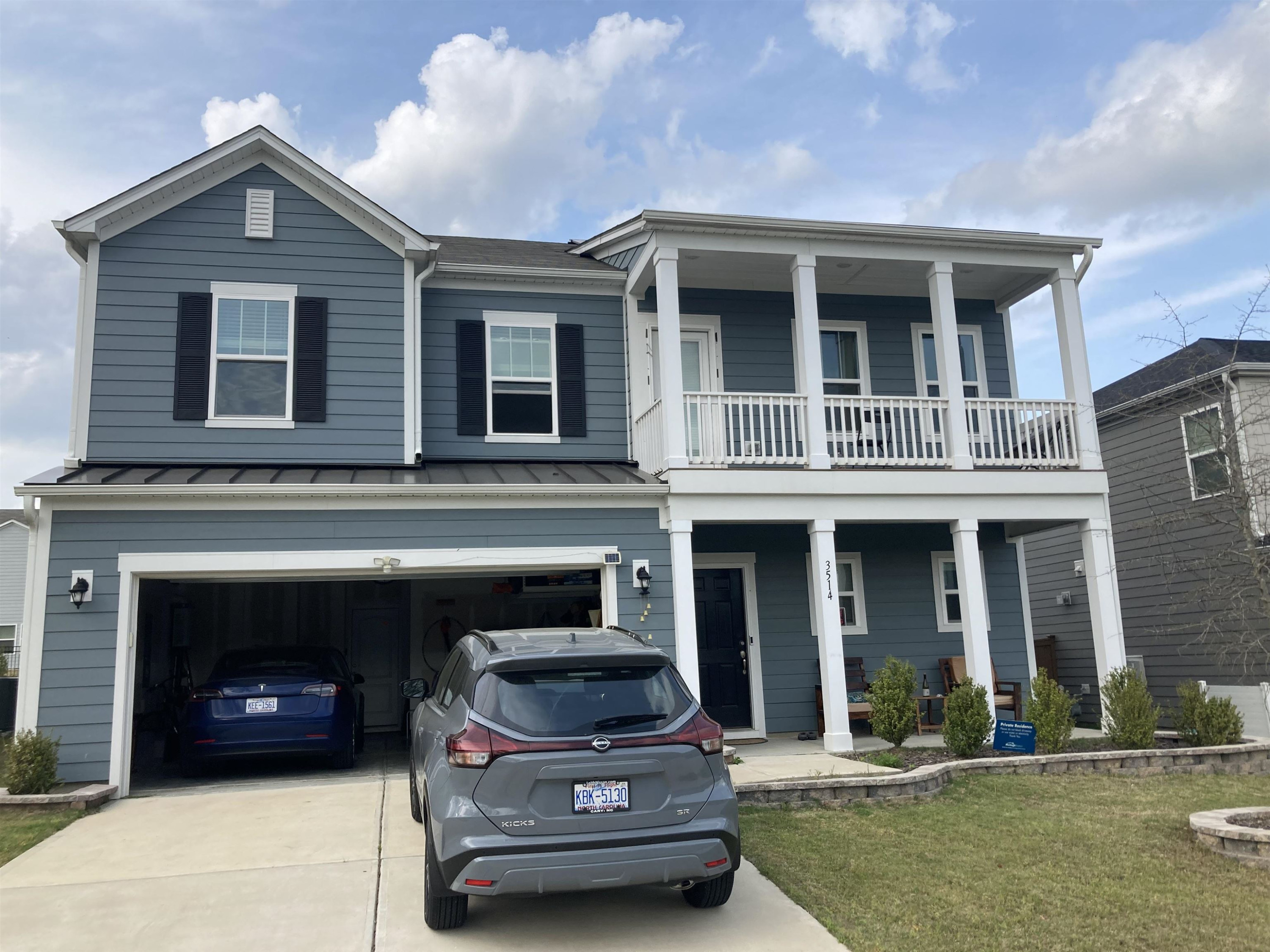 a car parked in front of a house