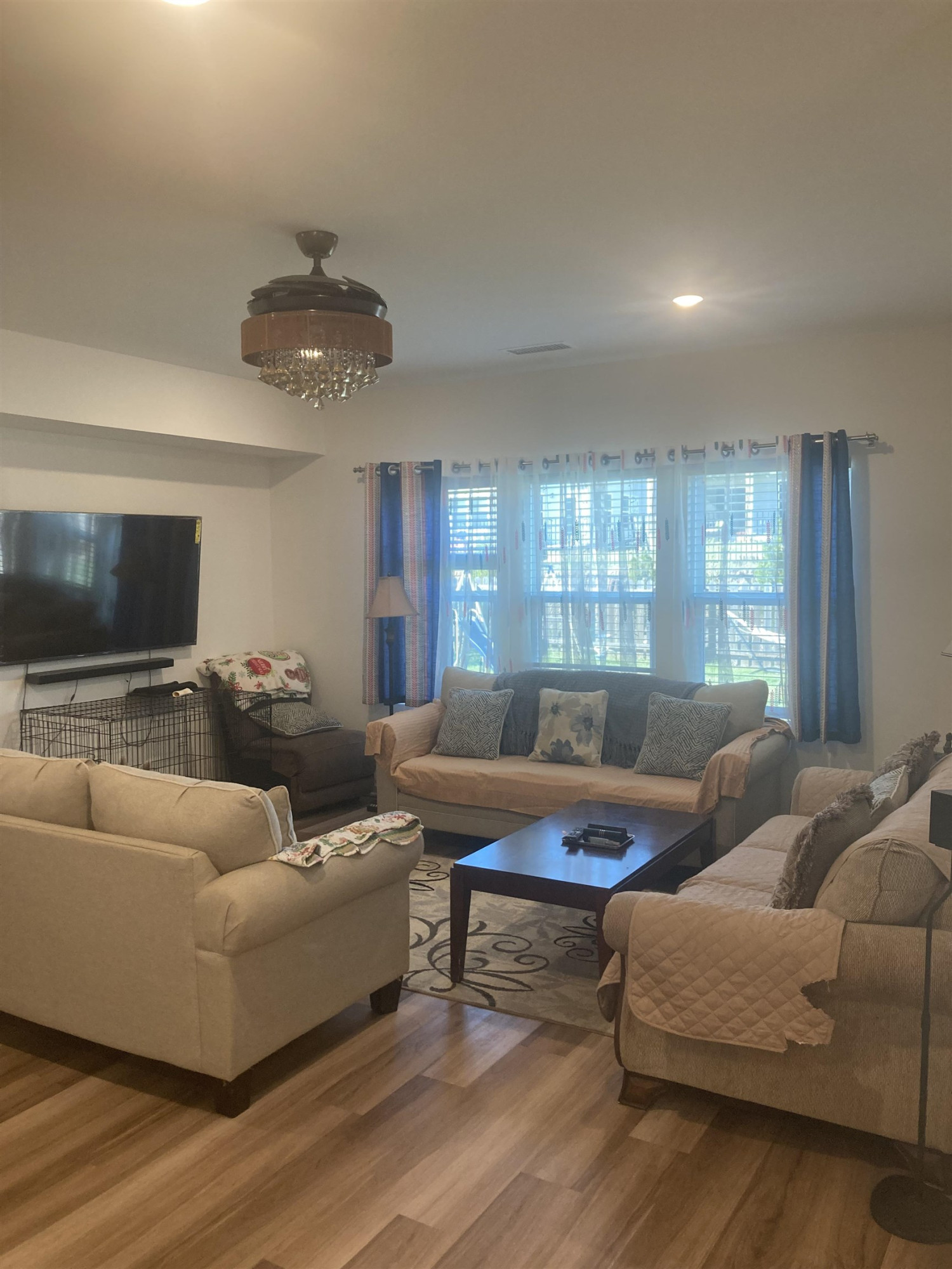 3514 Barn Road Apex, NC 27502 - Photo 16 of 53 a living room with furniture and a flat screen tv