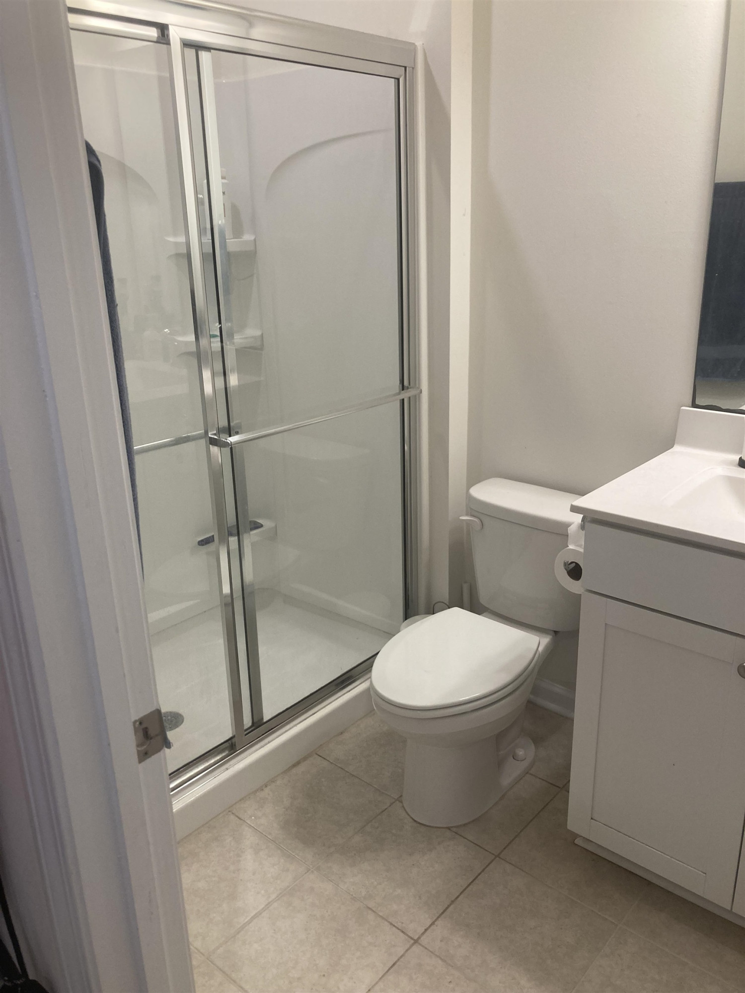 3514 Barn Road Apex, NC 27502 - Photo 22 of 53 a white toilet sitting next to a shower