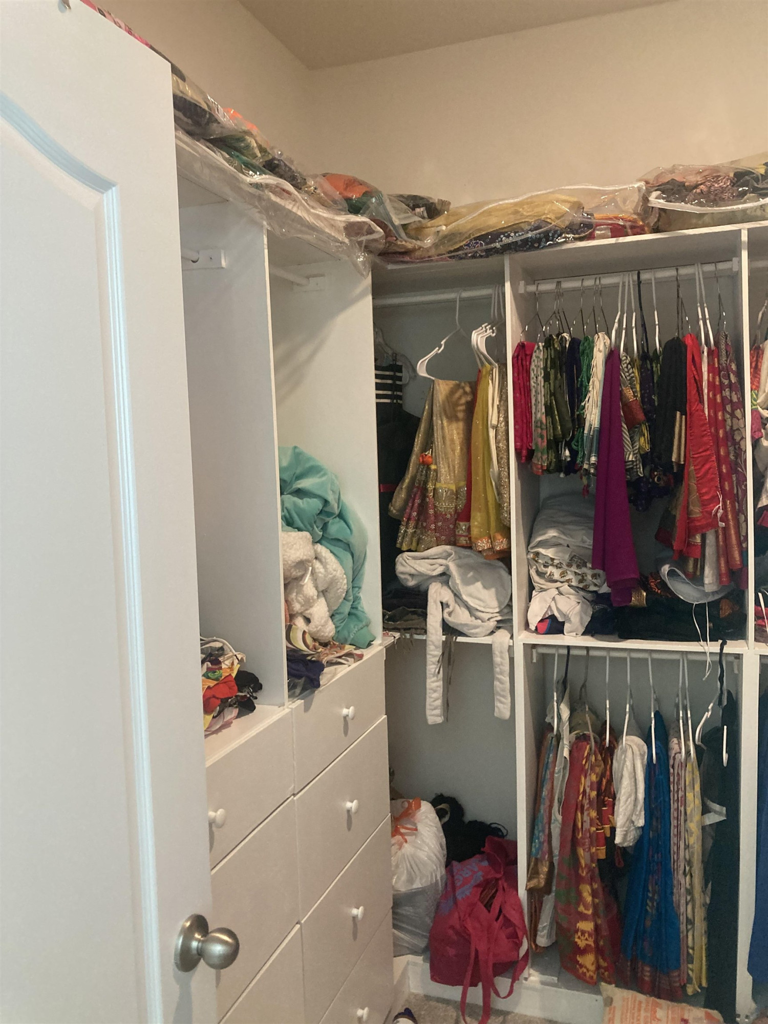 3514 Barn Road Apex, NC 27502 - Photo 34 of 53 a view of walk in closet with clothes and shoes