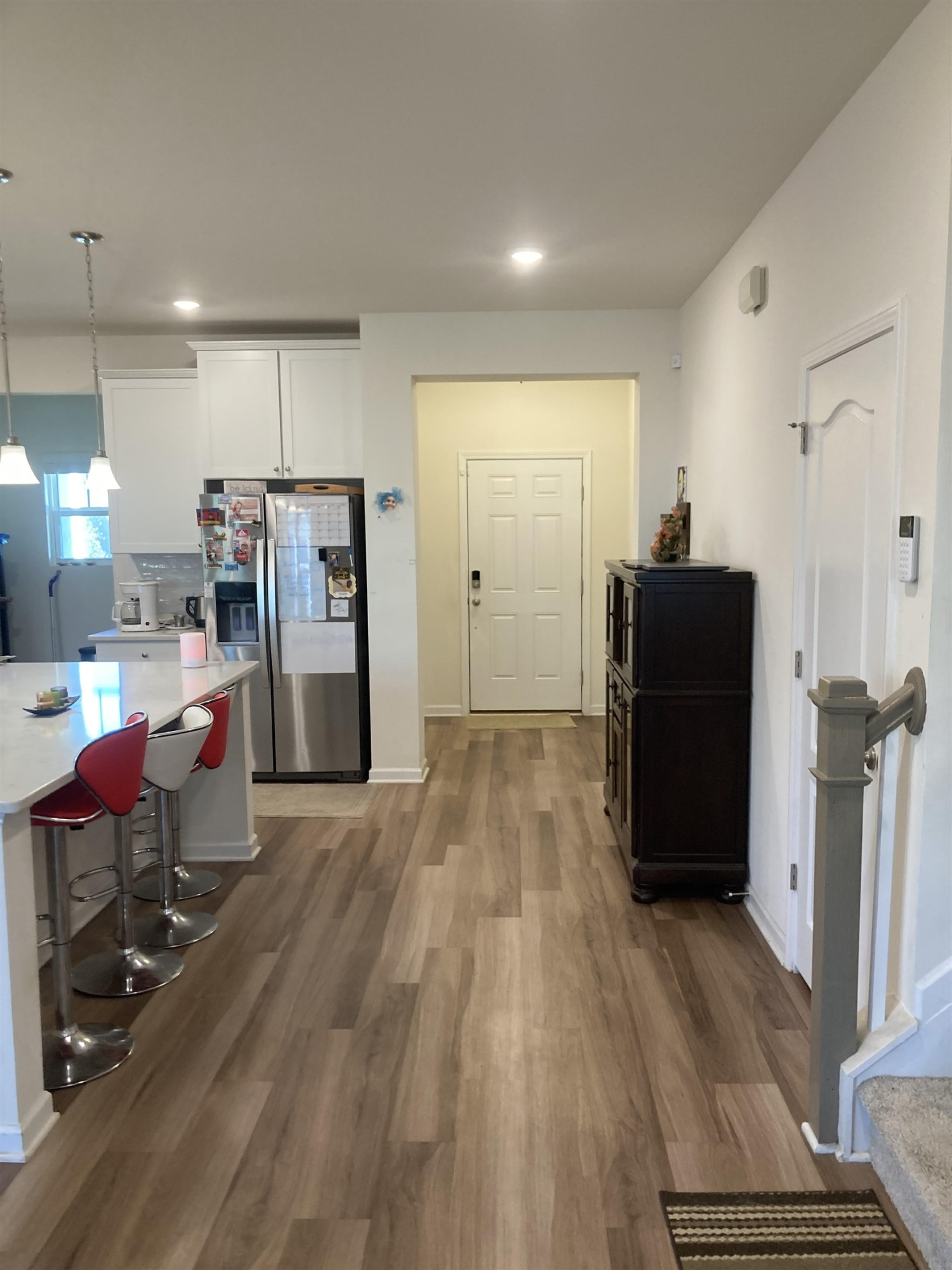 3514 Barn Road Apex, NC 27502 - Photo 45 of 53 a living room with furniture and a wooden floor