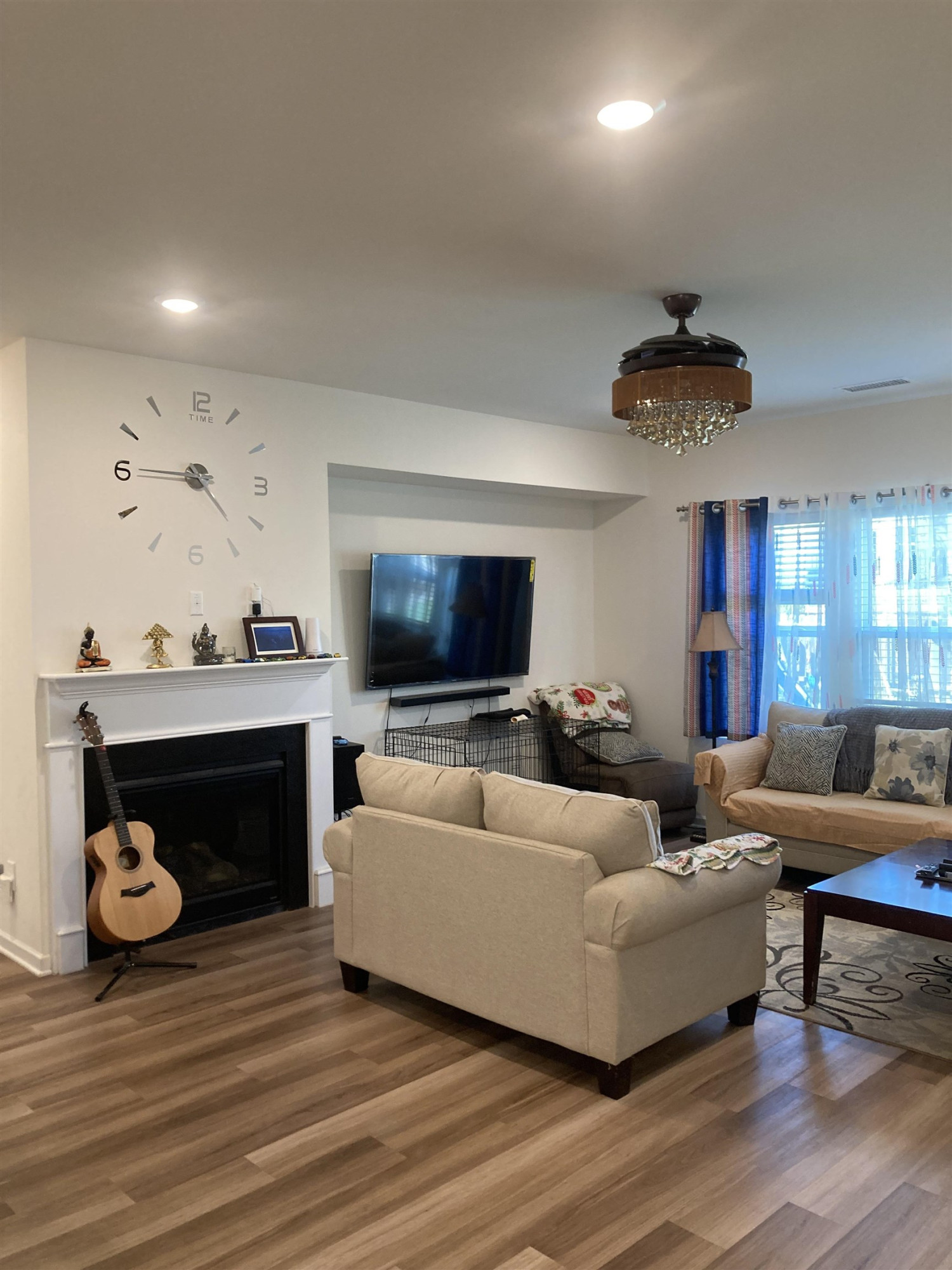 3514 Barn Road Apex, NC 27502 - Photo 51 of 53 a living room with furniture and a flat screen tv