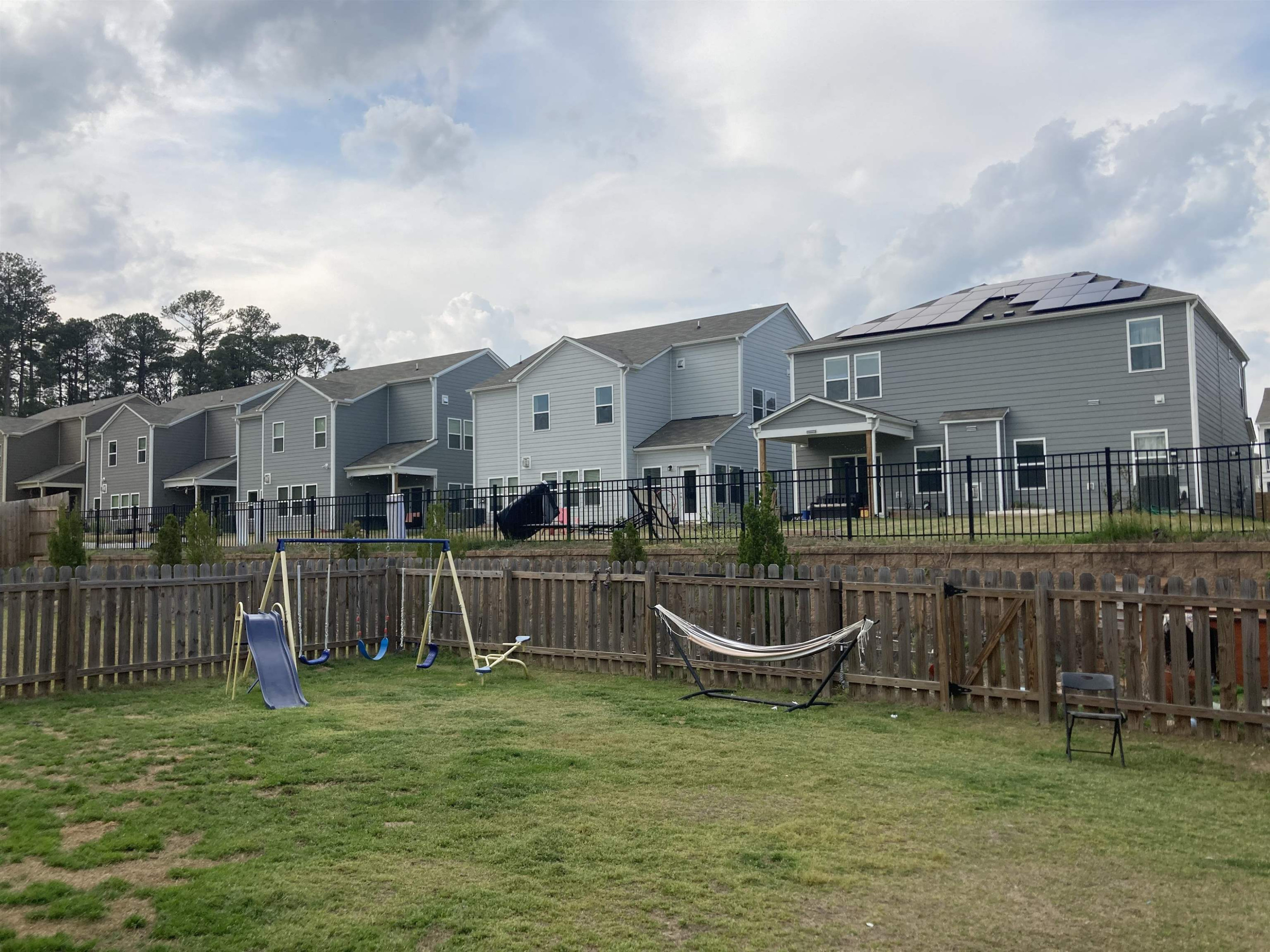 3514 Barn Road Apex, NC 27502 - Photo 7 of 53 a view of a house with backyard and a garden