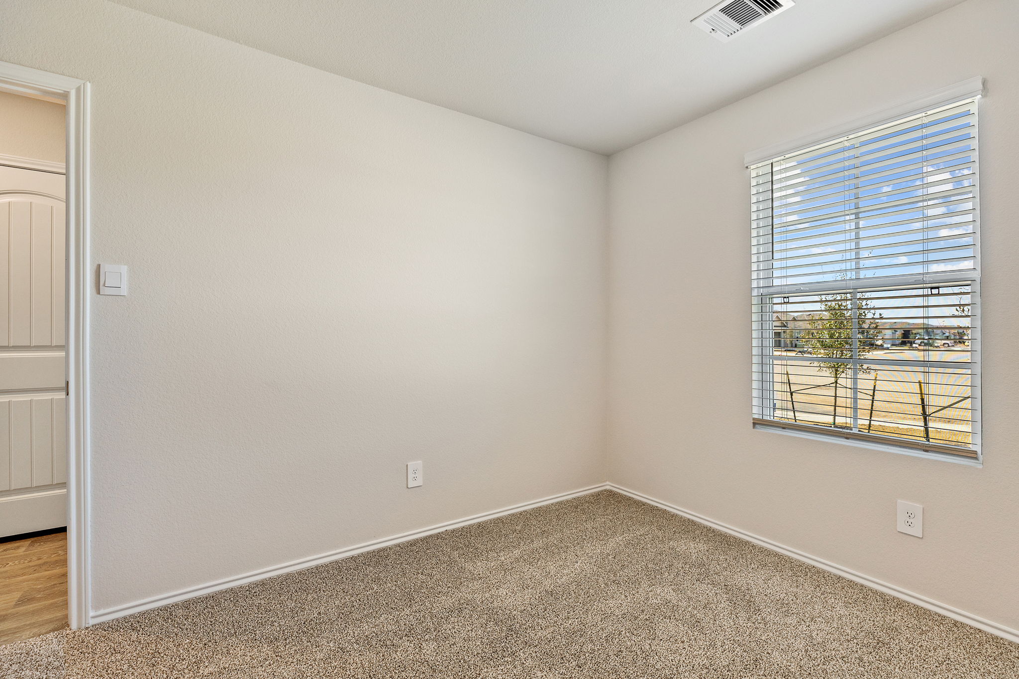 1702 Miller Terrace Lockhart, TX 78644 - Photo 12 of 21 an empty room with a window