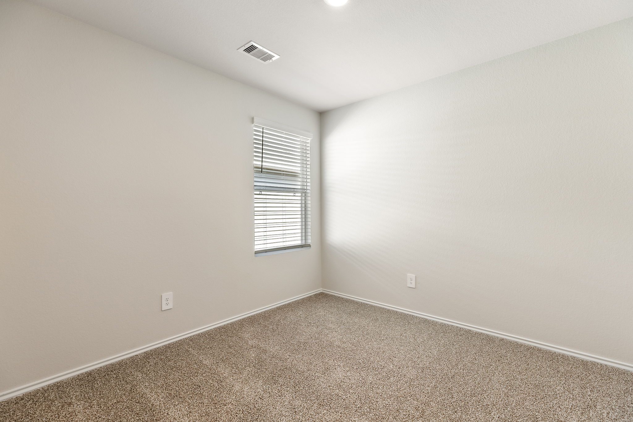1702 Miller Terrace Lockhart, TX 78644 - Photo 18 of 21 an empty room with a window