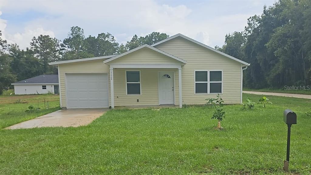 15028 Southwest 24th Place Ocala, FL 34481 - Photo 1 of 25 a view of outdoor space yard and front view of a house