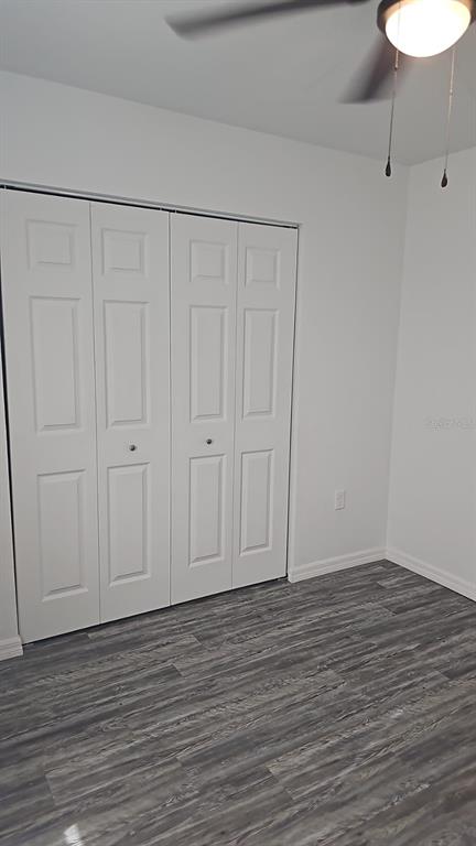 15028 Southwest 24th Place Ocala, FL 34481 - Photo 20 of 25 a view of an empty room and wooden floor