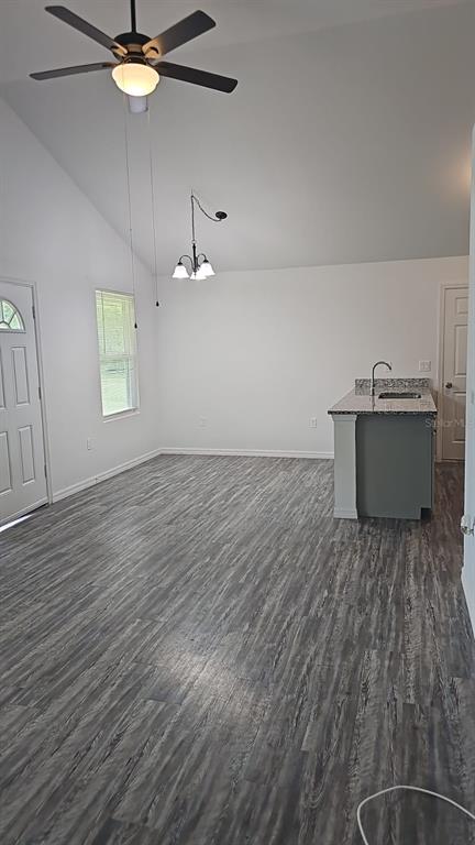 15028 Southwest 24th Place Ocala, FL 34481 - Photo 6 of 25 an empty room with wooden floor and windows