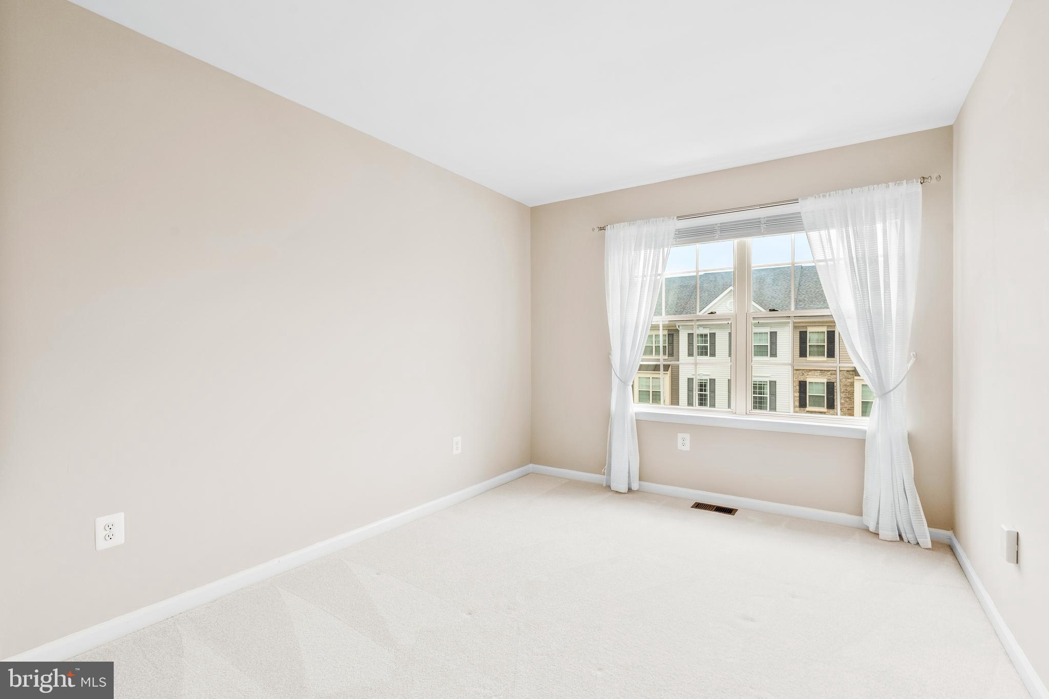 8479 Randell Ridge Road Frederick, MD 21704 - Photo 20 of 50 a view of an empty room with a window