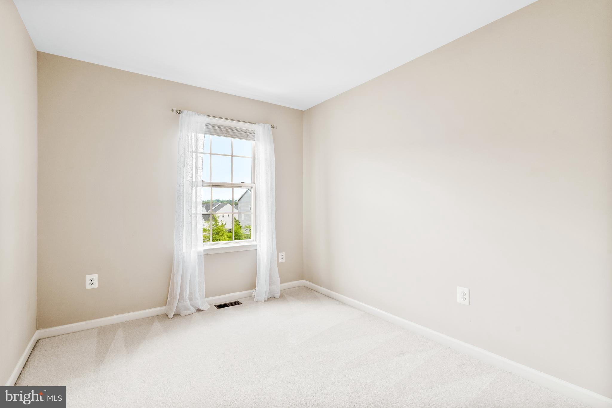 8479 Randell Ridge Road Frederick, MD 21704 - Photo 23 of 50 a view of an empty room with window