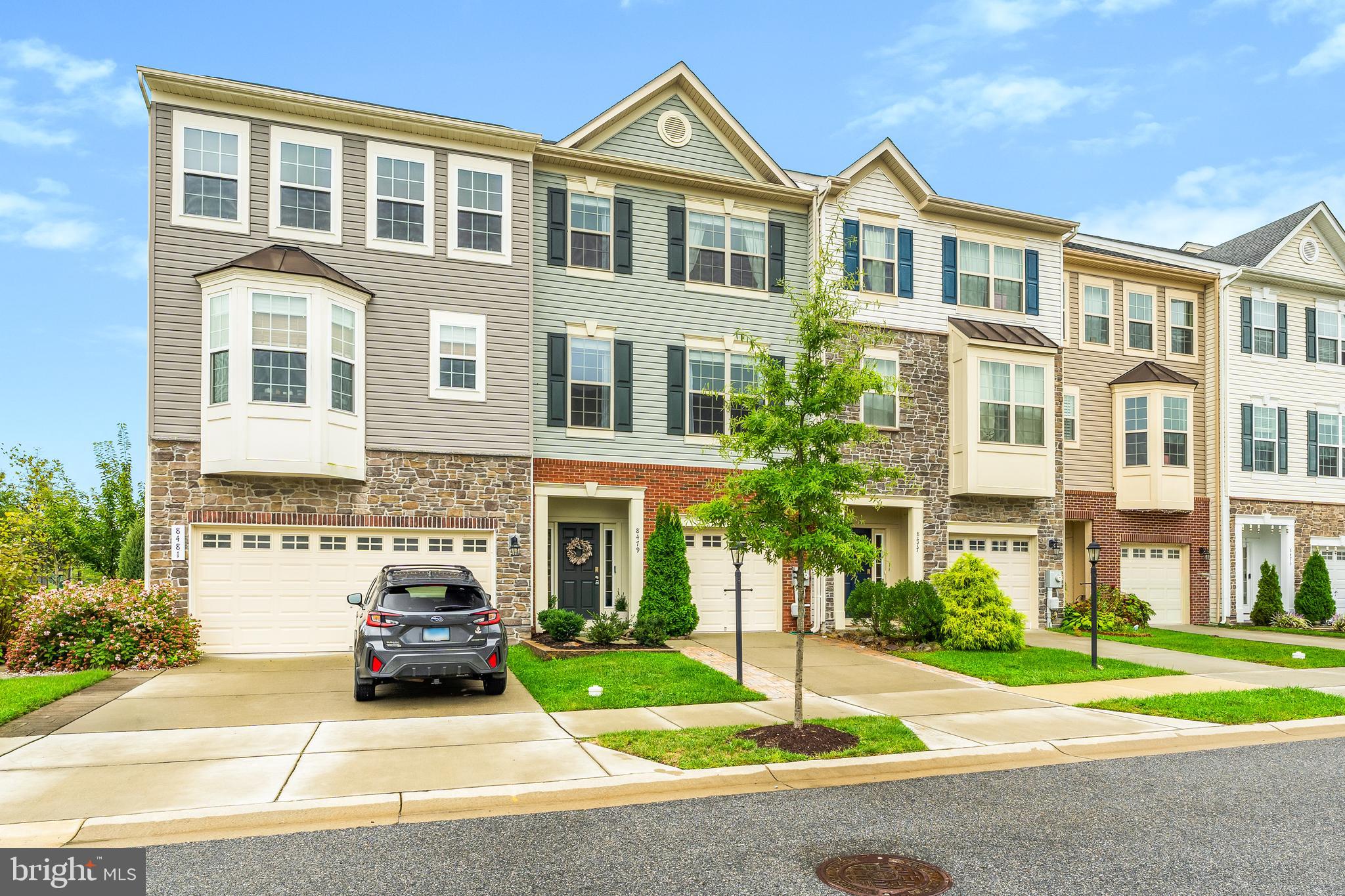 8479 Randell Ridge Road Frederick, MD 21704 - Photo 3 of 50 a front view of a house with a yard and trees