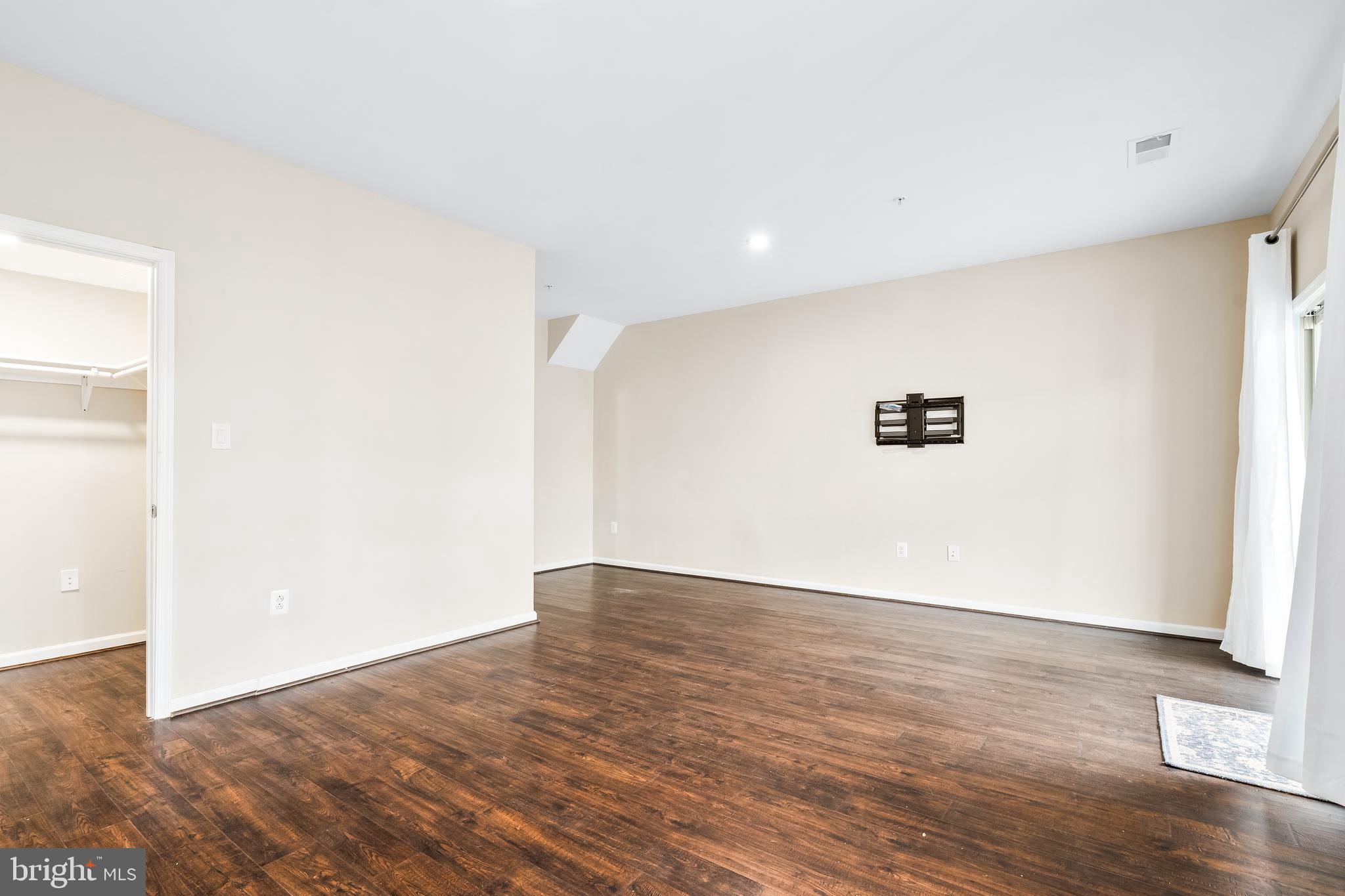 8479 Randell Ridge Road Frederick, MD 21704 - Photo 35 of 50 a view of an empty room with wooden floor