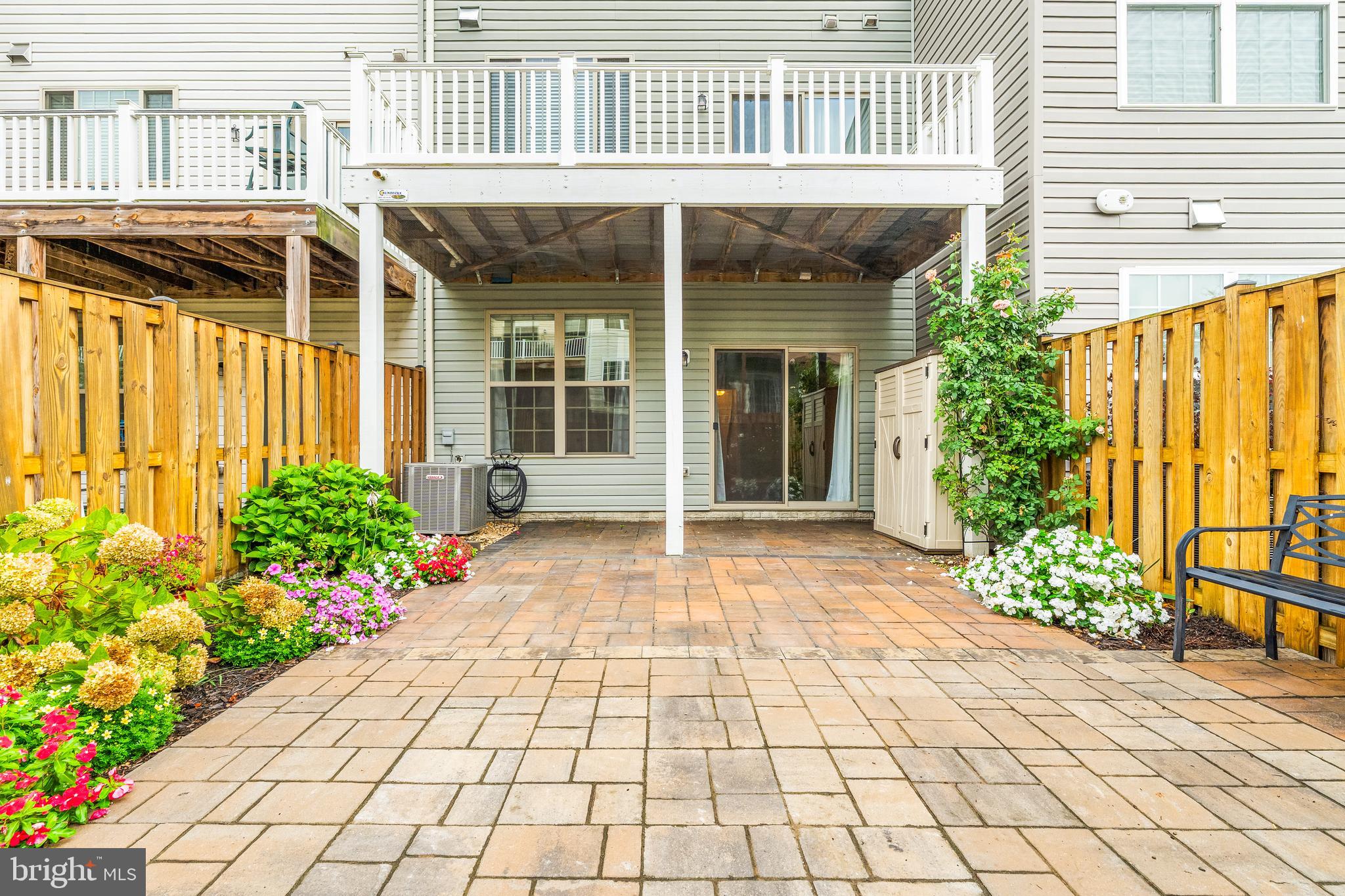 8479 Randell Ridge Road Frederick, MD 21704 - Photo 40 of 50 a view of a house with a large window and flower plants
