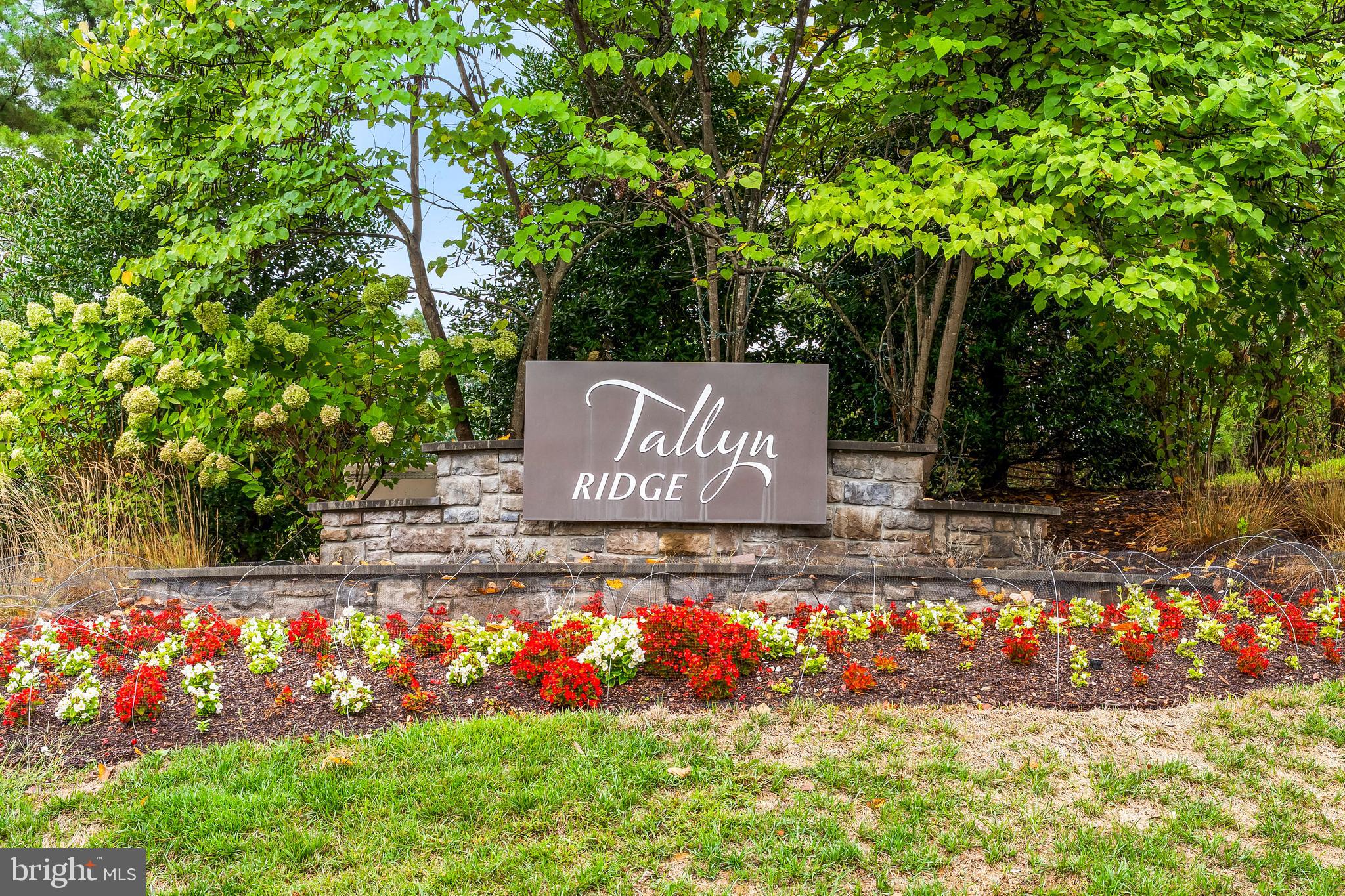 8479 Randell Ridge Road Frederick, MD 21704 - Photo 49 of 50 a view of a sign in front of flowers