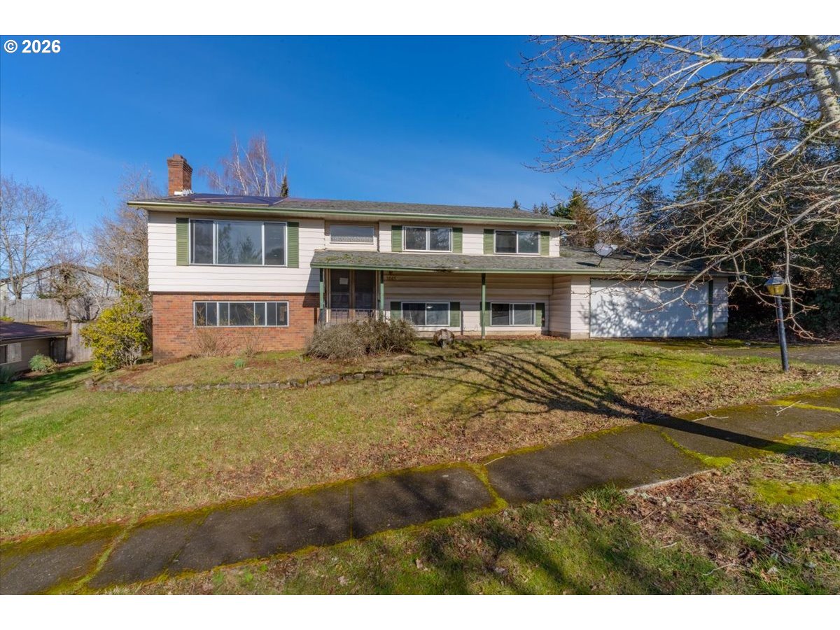 1645 Southwest 27th Street Gresham, OR 97080 - Photo 1 of 48 a view of a house with a swimming pool