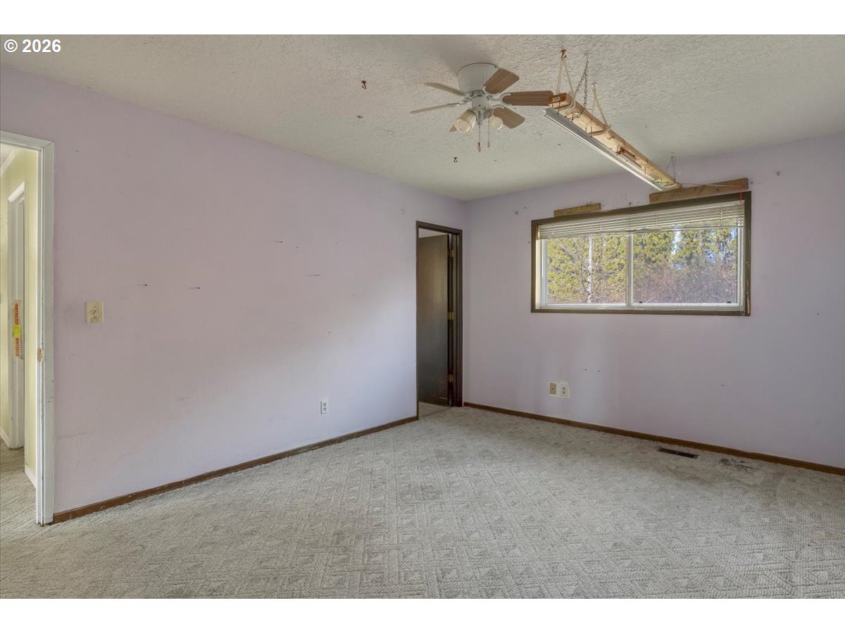 1645 Southwest 27th Street Gresham, OR 97080 - Photo 18 of 48 a view of an empty room with a window