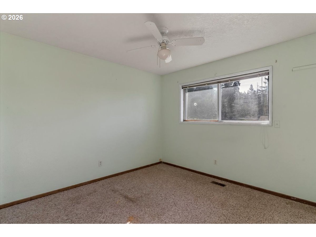 1645 Southwest 27th Street Gresham, OR 97080 - Photo 21 of 48 a view of an empty room with a window