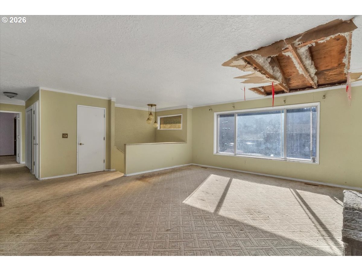 1645 Southwest 27th Street Gresham, OR 97080 - Photo 3 of 48 a view of an empty room and window