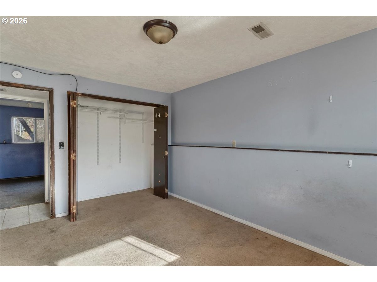 1645 Southwest 27th Street Gresham, OR 97080 - Photo 38 of 48 a view of a livingroom with an empty space