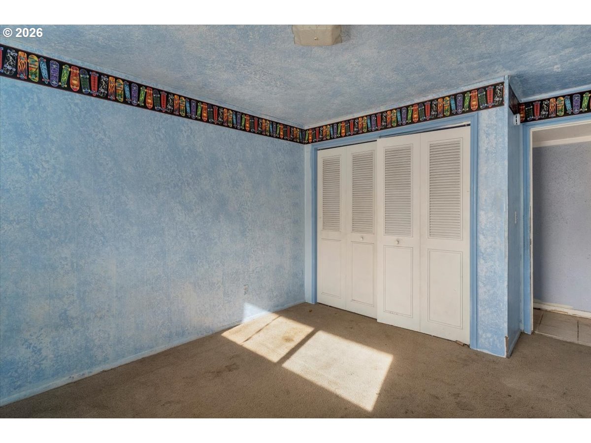 1645 Southwest 27th Street Gresham, OR 97080 - Photo 40 of 48 a view of a room with wooden floor