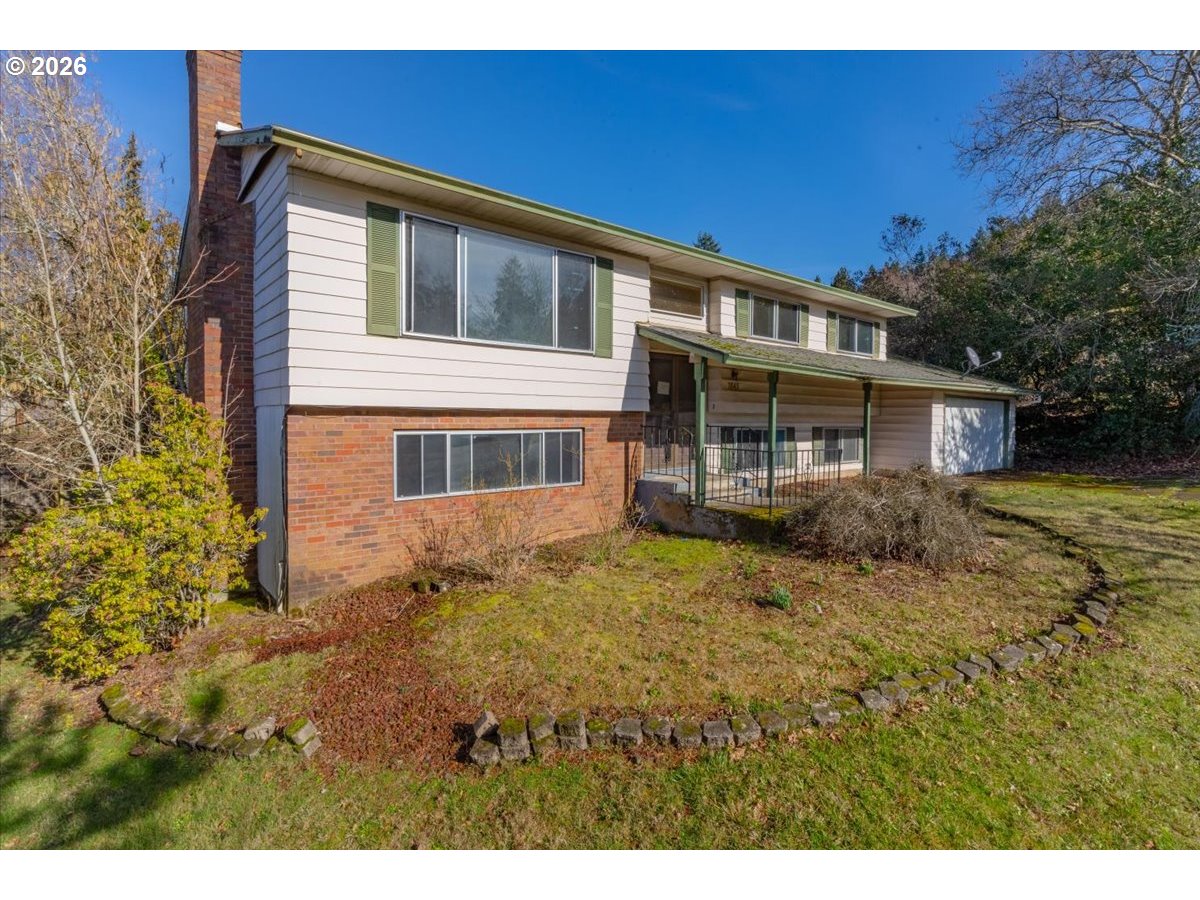 1645 Southwest 27th Street Gresham, OR 97080 - Photo 48 of 48 a view of a house with a backyard