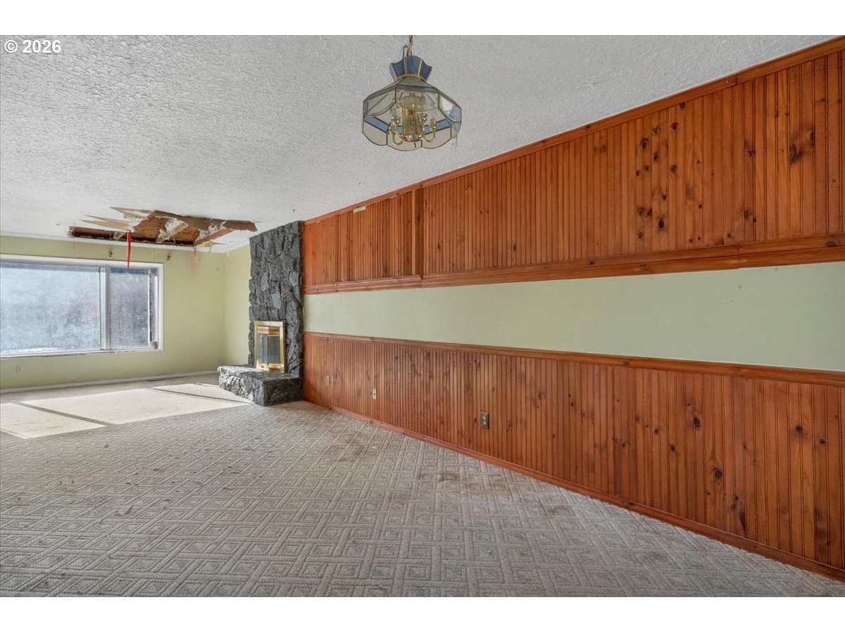 1645 Southwest 27th Street Gresham, OR 97080 - Photo 9 of 48 a view of a room with wooden floor