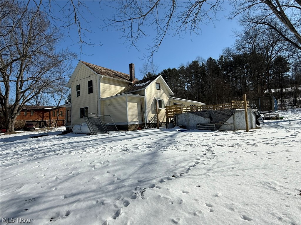 6784 Old Zoarville Road Northeast Dover, OH 44622 - Photo 46 of 50 Snow covered property featuring a deck