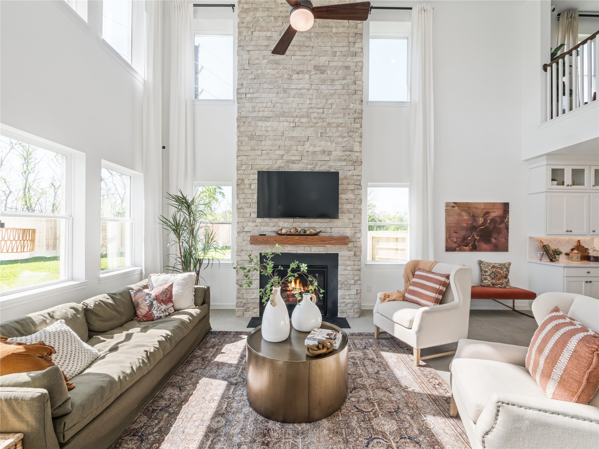 5802 Chamberlain Crossing Rosenberg, TX 77471 - Photo 5 of 37 Impressive great room with cozy fireplace (*Photo not of actual home and used for illustration purposes only.)