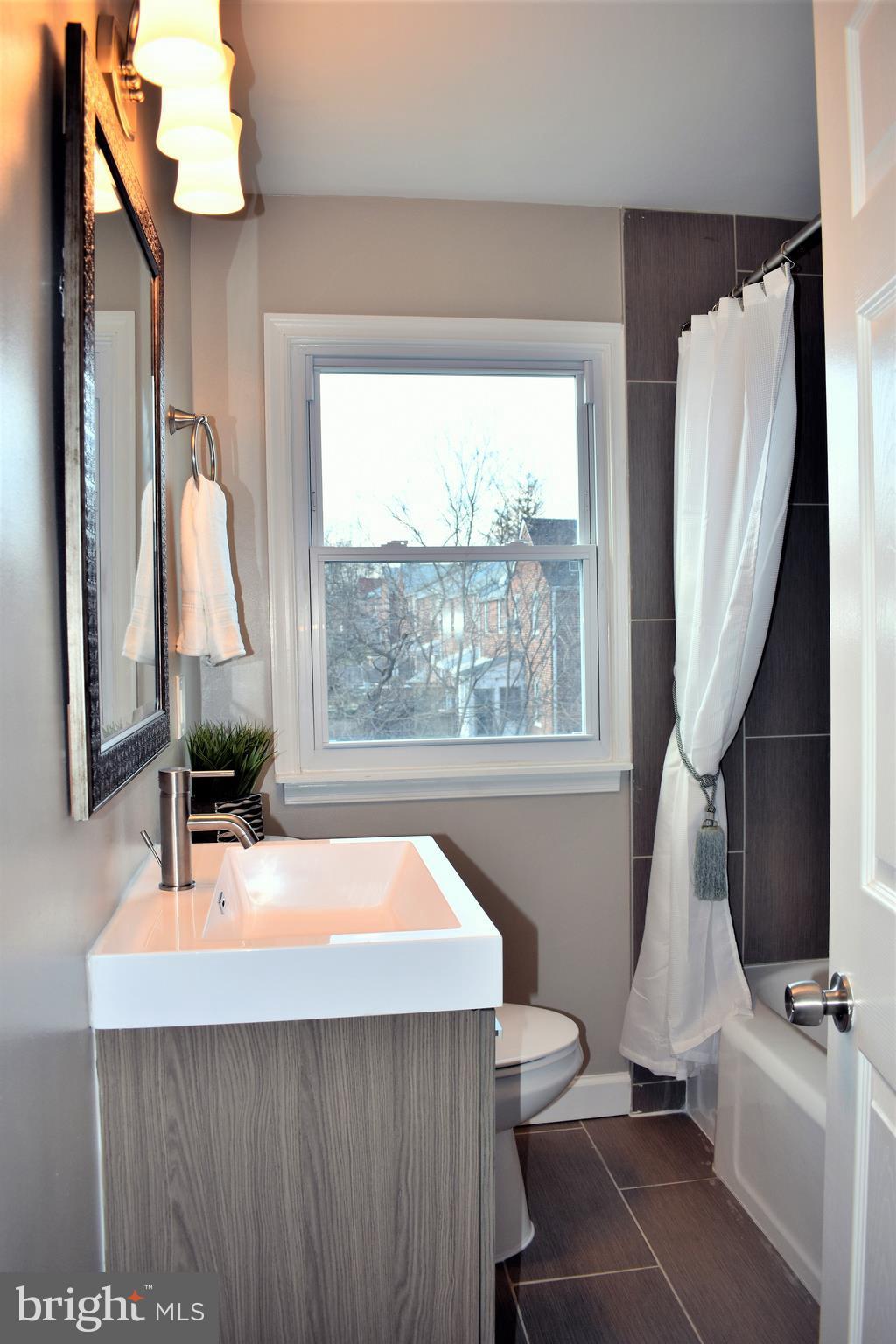 5701 Edgepark Road Baltimore, MD 21239 - Photo 14 of 15 Floating Vanity