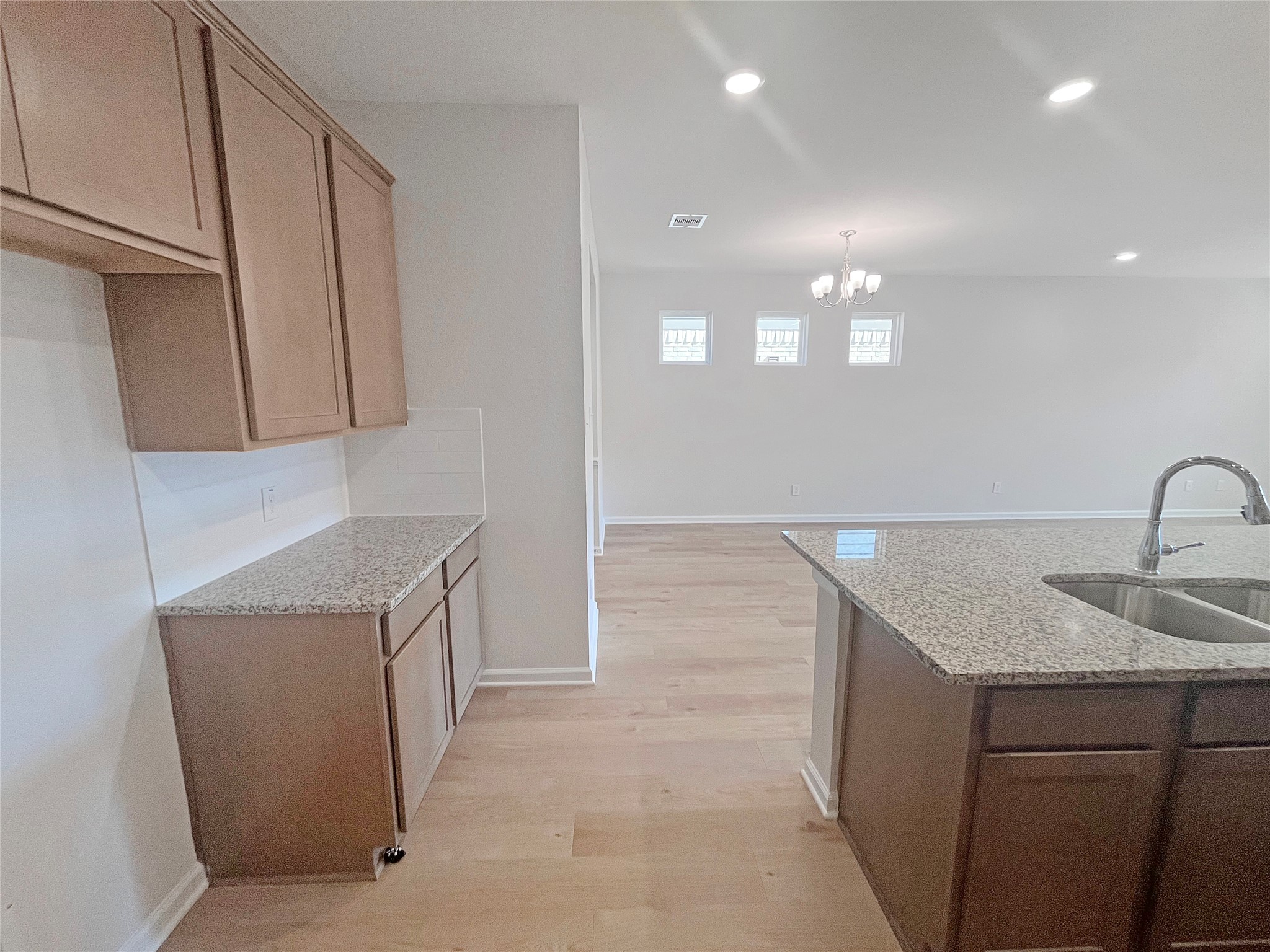 9781 Enclave Ridge Road Willis, TX 77318 - Photo 6 of 24 The Robin II- Kitchen. Sample image to be used for example only, colors, options and upgrades vary.