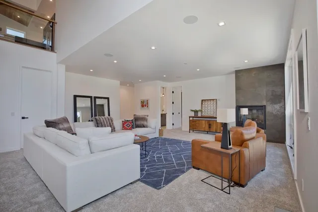 a living room with furniture and a couch