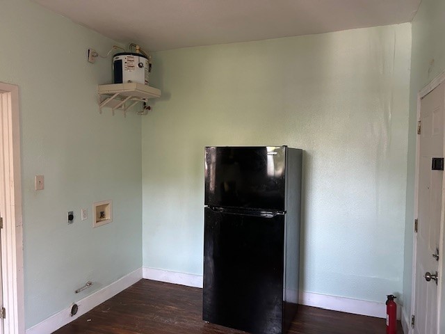 4725 Avenue R 1/2 Galveston, TX 77551 - Photo 3 of 18 a view of walk in closet with clothes and shoes