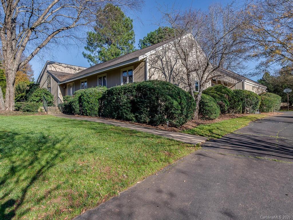 5012 Rounding Run Road Charlotte, NC 28277 - Photo 2 of 28 a front view of a house with yard and green space