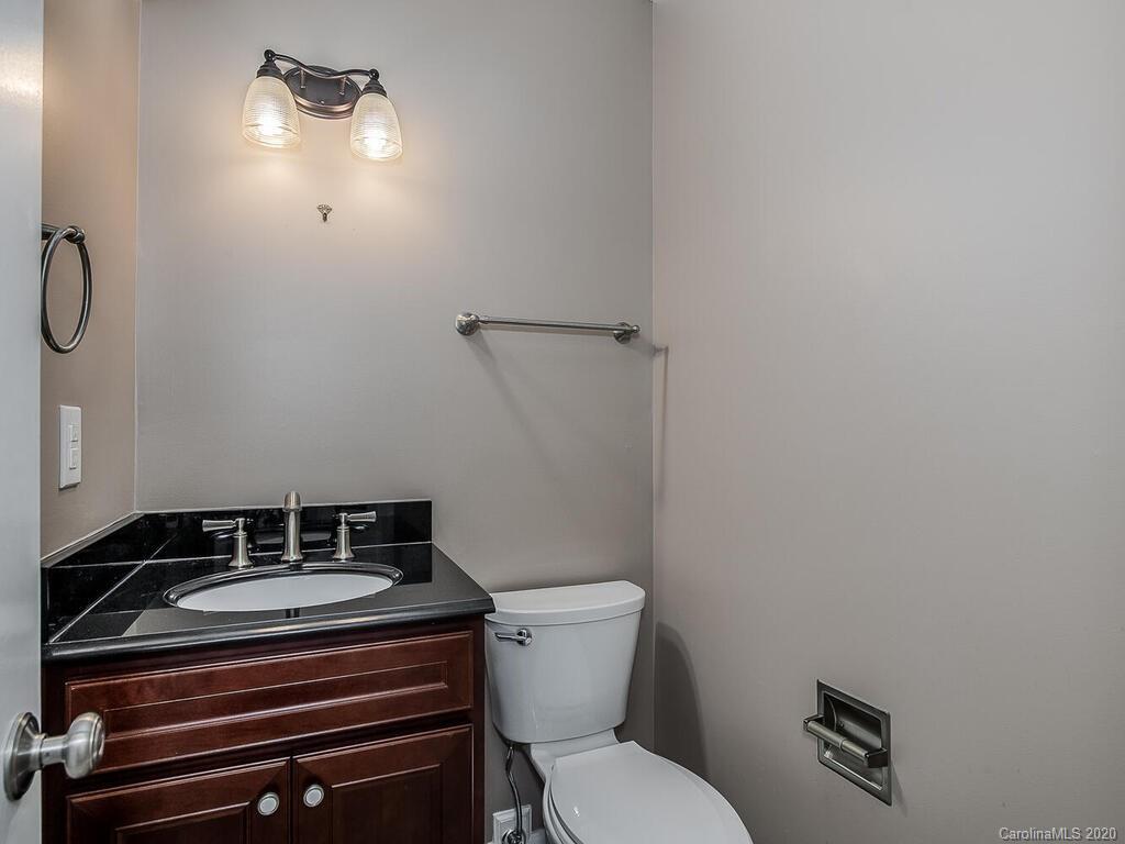 5012 Rounding Run Road Charlotte, NC 28277 - Photo 16 of 28 a bathroom with a sink and a toilet