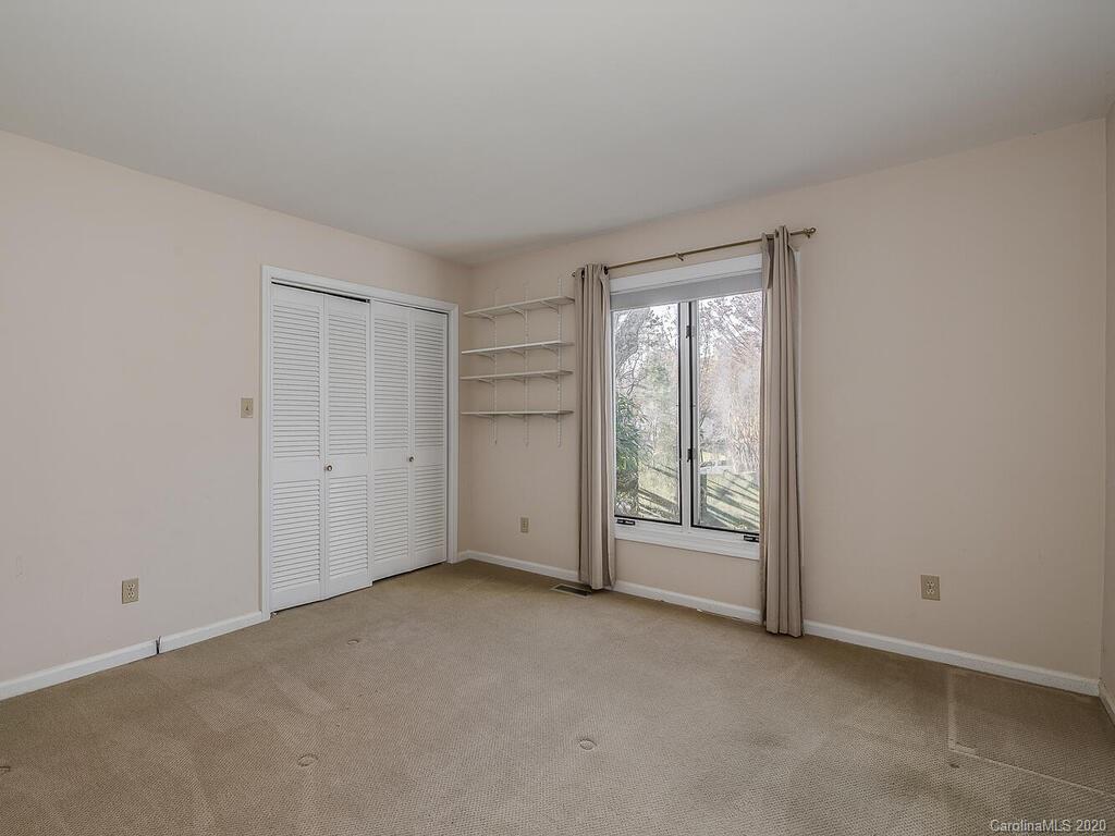 5012 Rounding Run Road Charlotte, NC 28277 - Photo 21 of 28 a view of an empty room with a window