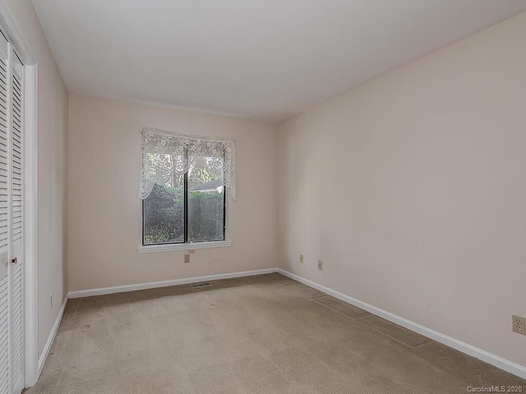 5012 Rounding Run Road Charlotte, NC 28277 - Photo 23 of 28 an empty room with a window