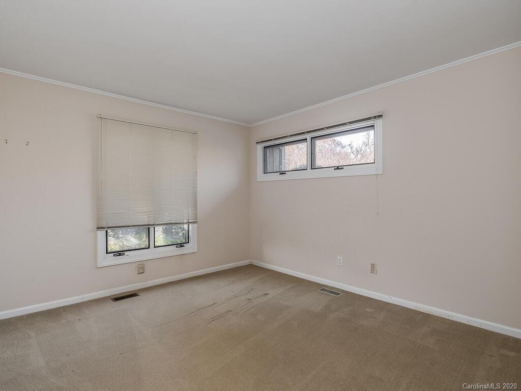 5012 Rounding Run Road Charlotte, NC 28277 - Photo 24 of 28 an empty room with a empty space and window