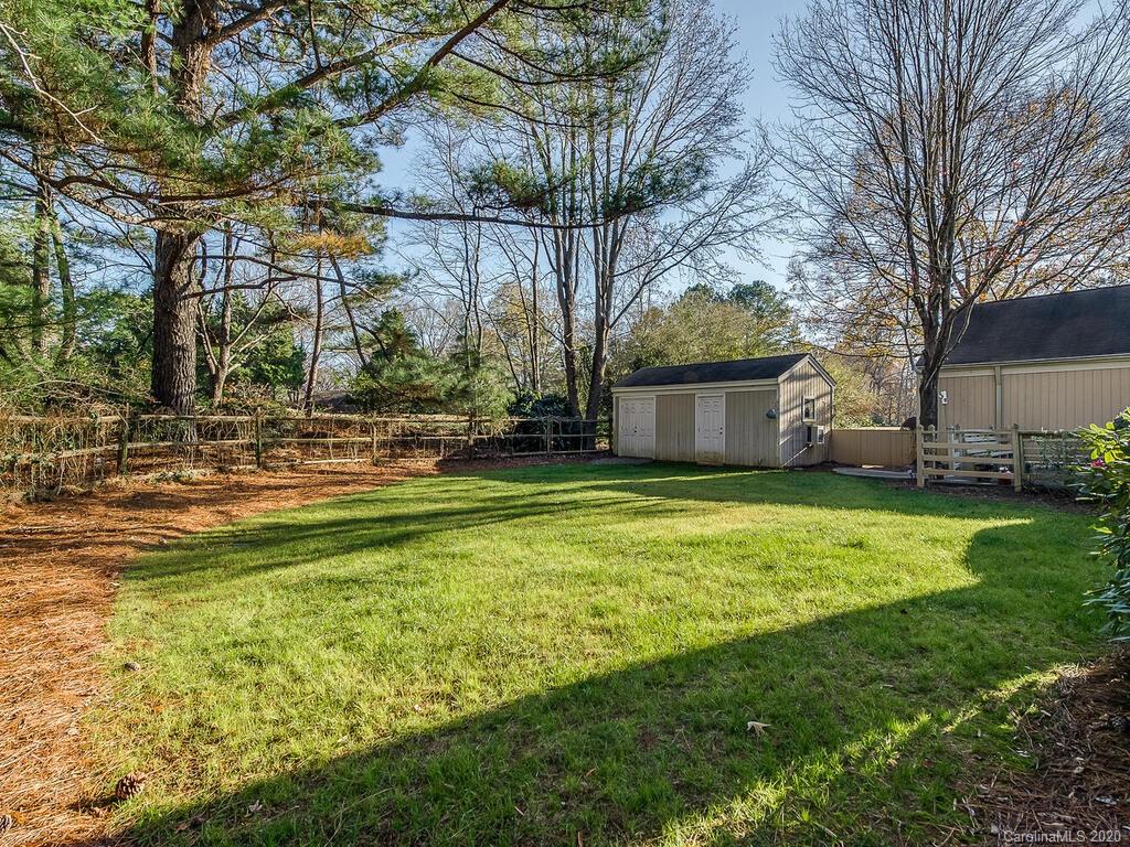 5012 Rounding Run Road Charlotte, NC 28277 - Photo 26 of 28 a view of a house with a yard
