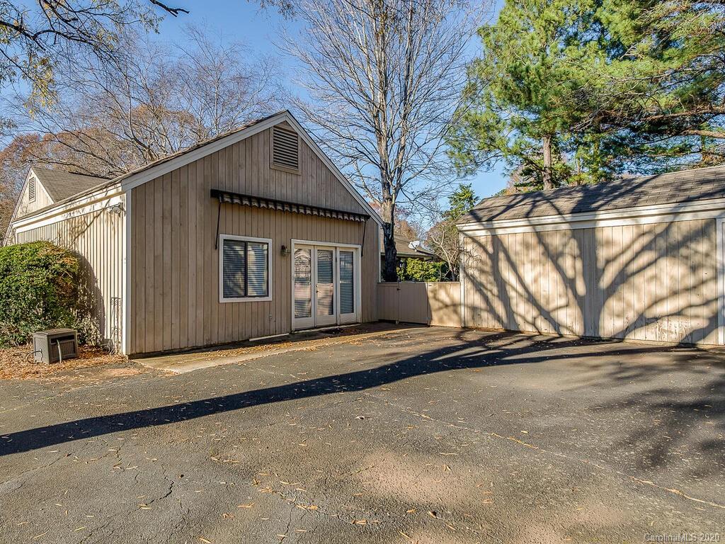 5012 Rounding Run Road Charlotte, NC 28277 - Photo 28 of 28 a front view of a house with a yard and garage