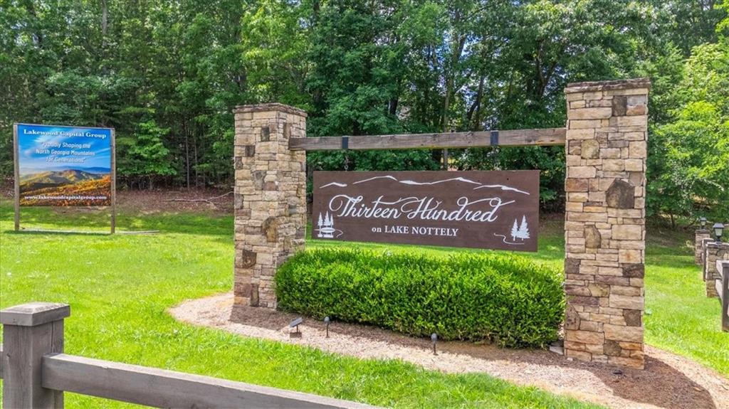 276 Ridge Pointe Way Blairsville, GA 30512 - Photo 6 of 15 a view of a garden with a building in the background