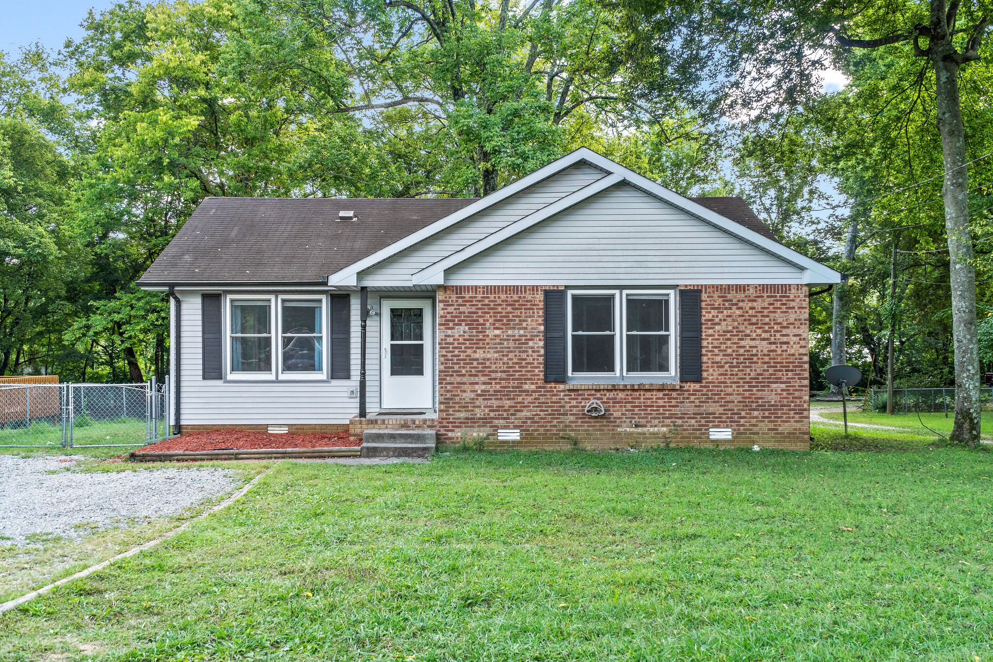 742 Needmore Road Clarksville, TN 37040 - Photo 2 of 35 a front view of a house with a yard